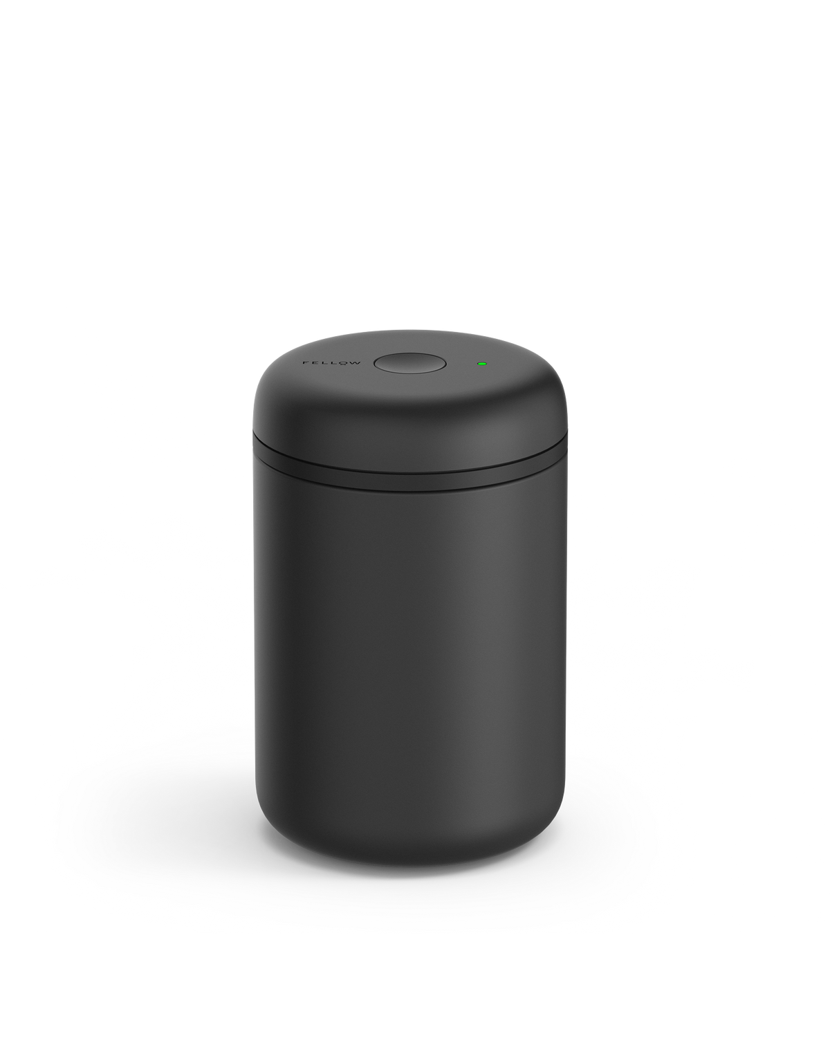 Fellow Atmos Vacuum Canister in matte black with a round lid and small top button.
